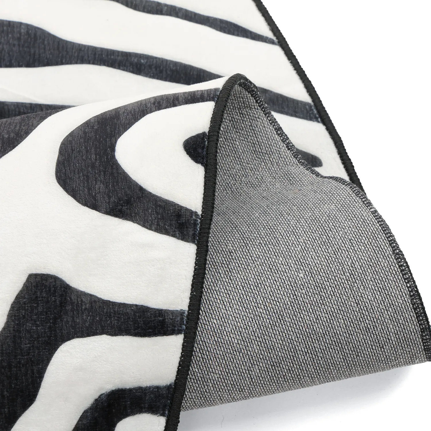 Tapete Wilton redondo com borda ondulada - Zebra (preto/branco)