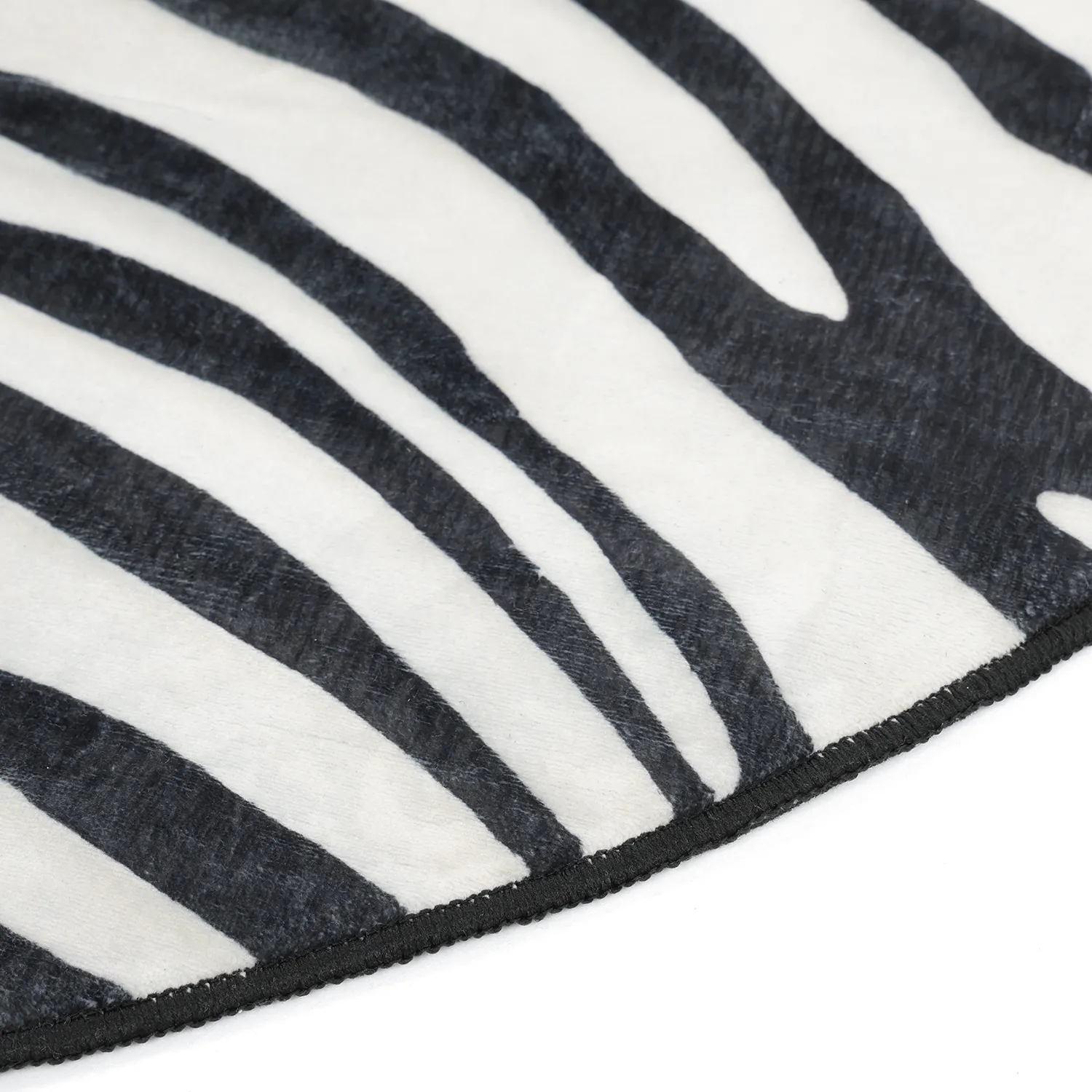 Tapete Wilton redondo com borda ondulada - Zebra (preto/branco)